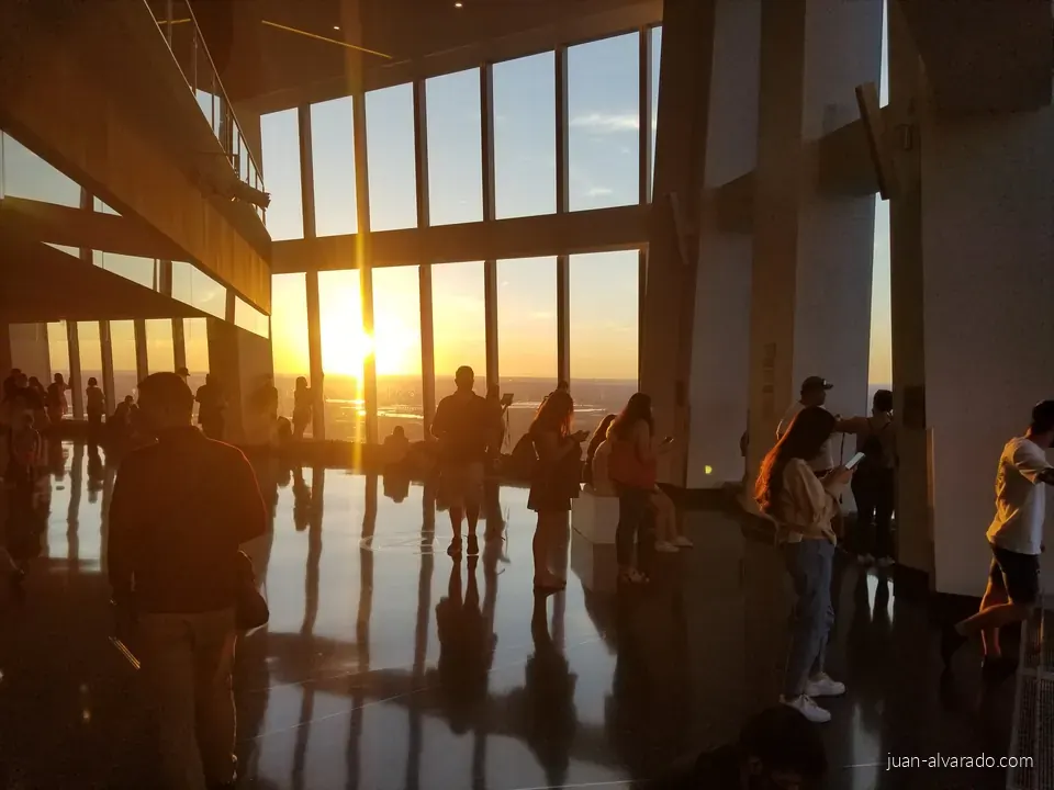 Visitors silhouetted against the sunset