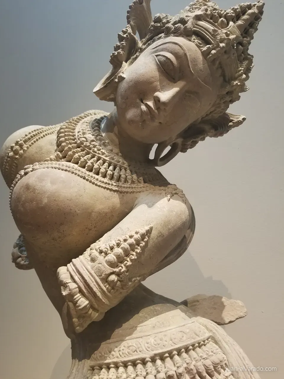A carved stone figure at the Met