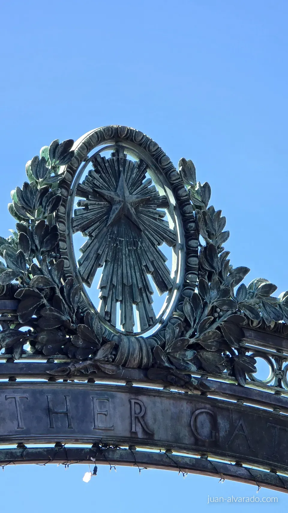 Ornamental ironwork on a campus gate